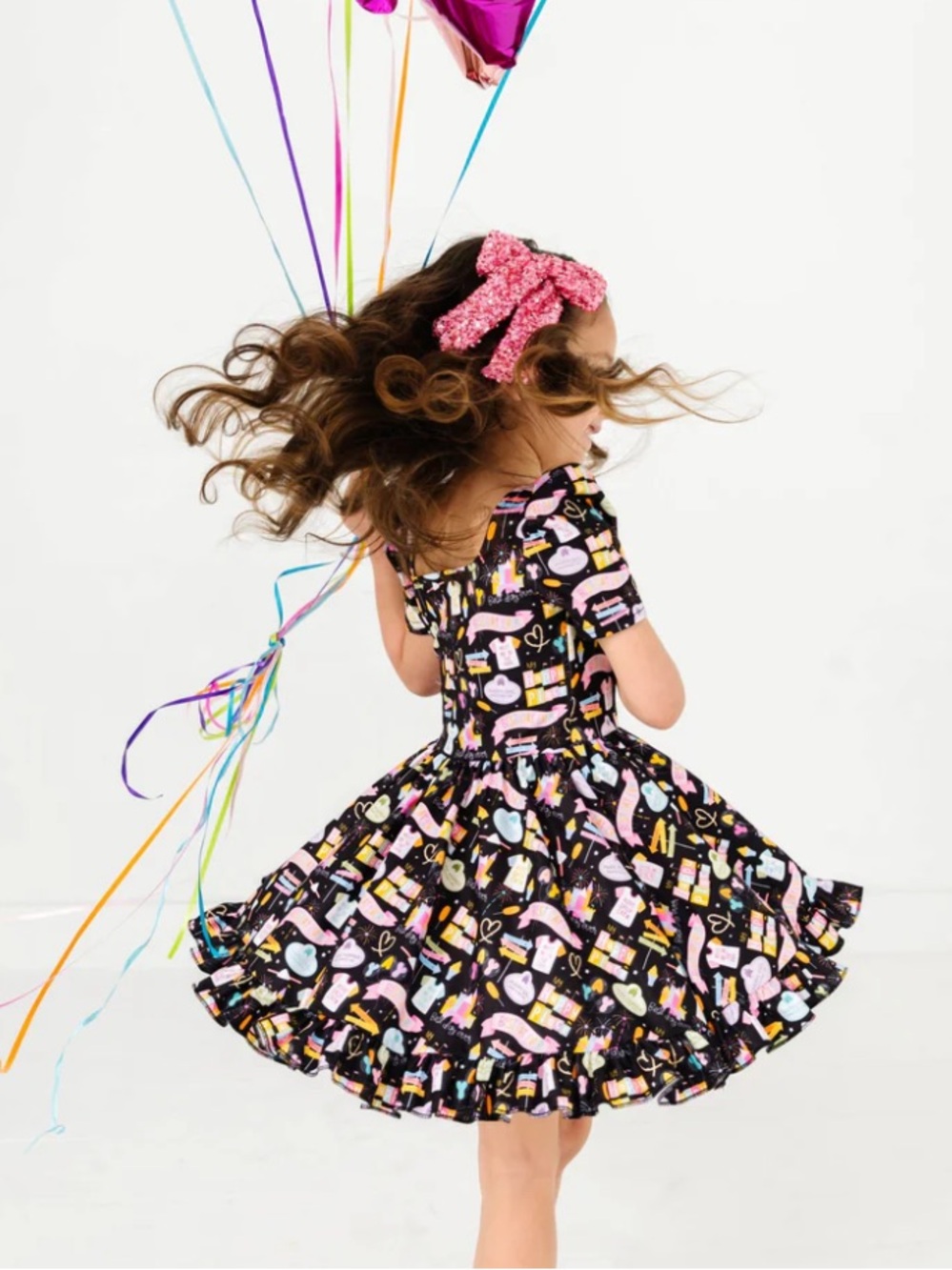Little Stocking Company Black New Years Twirl Dress with Colorful Print